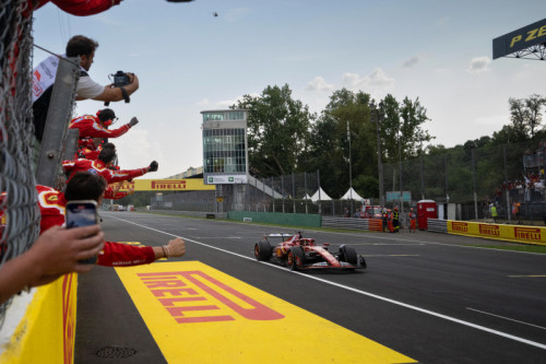 500_teammembersofscuderiaferraricelebrateatcharlesleclercferrarisf-241stpositioncrossesthefinishline