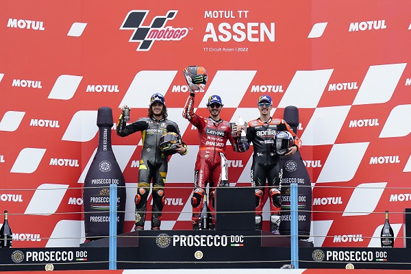 MotoGP™ podio s-d Bezzecchi - Bagnaia - Viñales