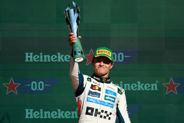 1920_racewinnerlandonorriswiththepirellidesignpodiumcap