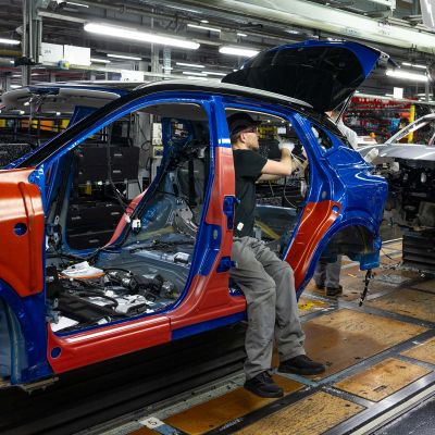 Production sequence Qashqai being assembled on the trim line at Nissan Sunderland